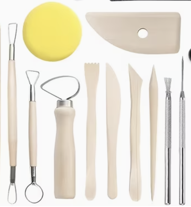 The Alali eight-piece pottery tool set laid out on a table